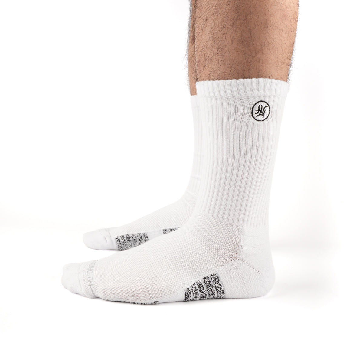 White Performance Crew Socks worn on model, side view